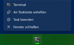 Barre des taches de Windows 11 avec le menu contextuel ouvert sur un poste en cours d'utilisation